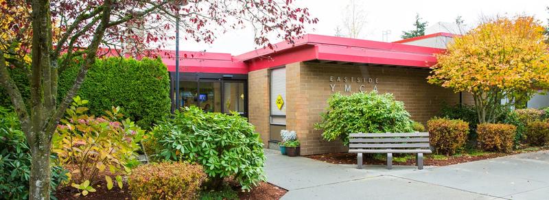 The entrance of Bellevue Family YMCA, with the YMCA sign over the doors.