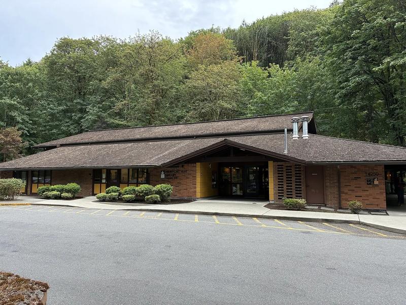 Newport Way Library, a low building with a broad glass front and a covered entry.