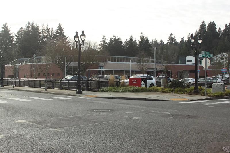 Bothell Library, a modern building with a glass and wood front and a tall entry.