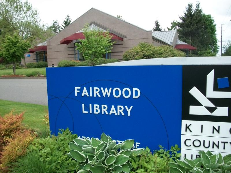Fairwood Library sign and building along the street in Renton.