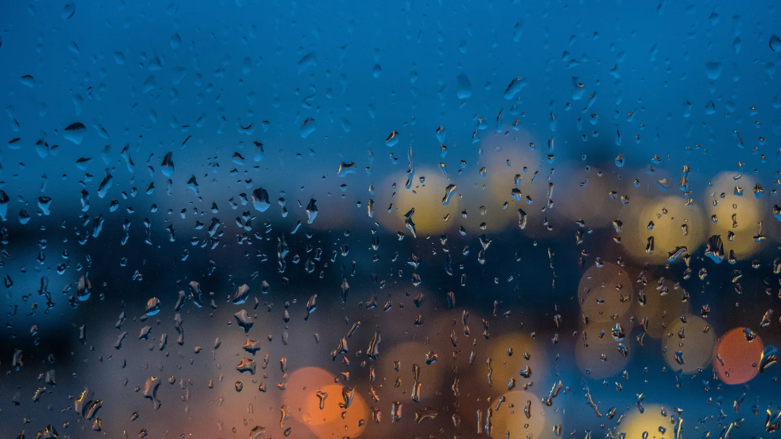 Rain streaking down a window.