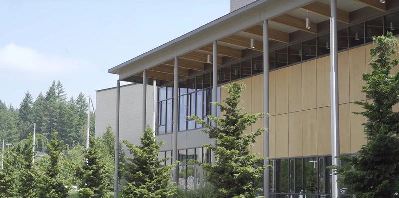Issaquah High School, a long brick building with a covered walkway.