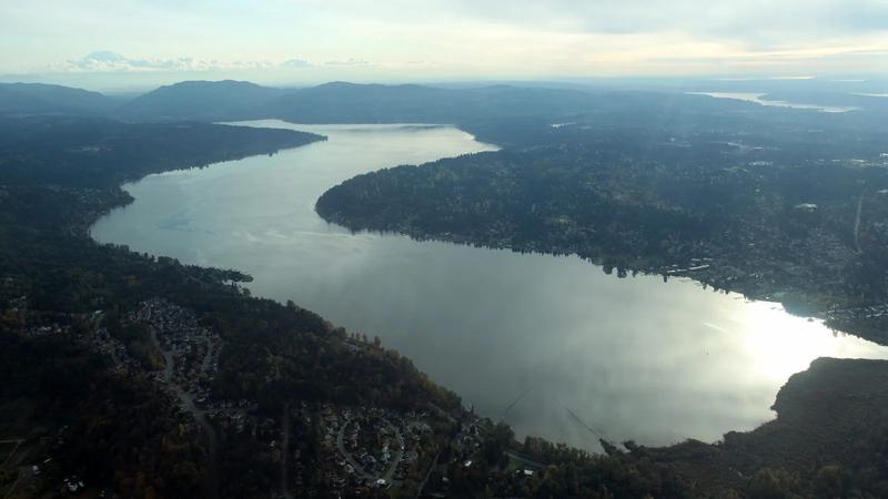 Aerial view of Lake Sammamish from the north end, looking south over the water and the hills.