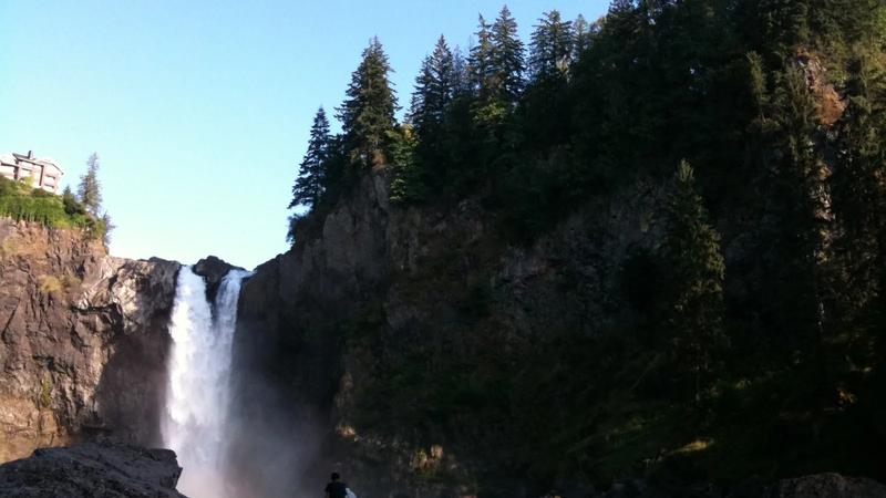 Snoqualmie Falls, with the river dropping through a rocky gorge.
